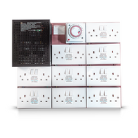 Industrial contactor board with white timer dials and multiple socket modules