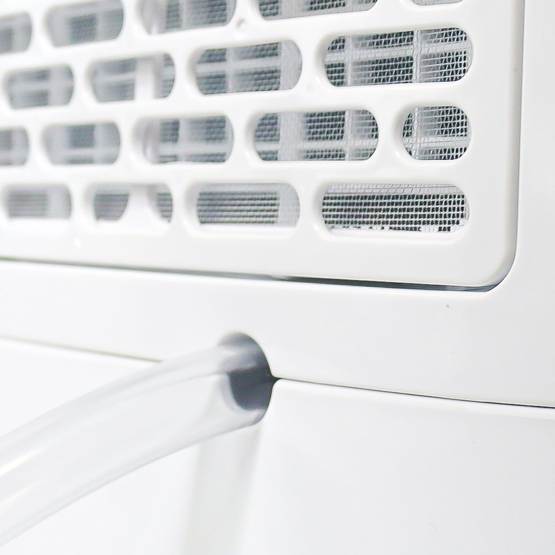 Dehumidifier air intake grille and vent openings on front