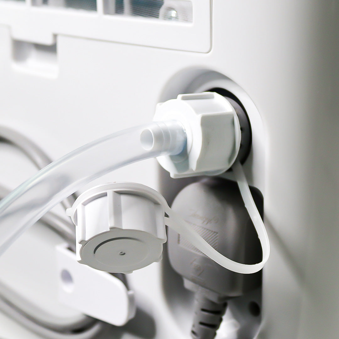 White 40L dehumidifier with attached drain hose fitting