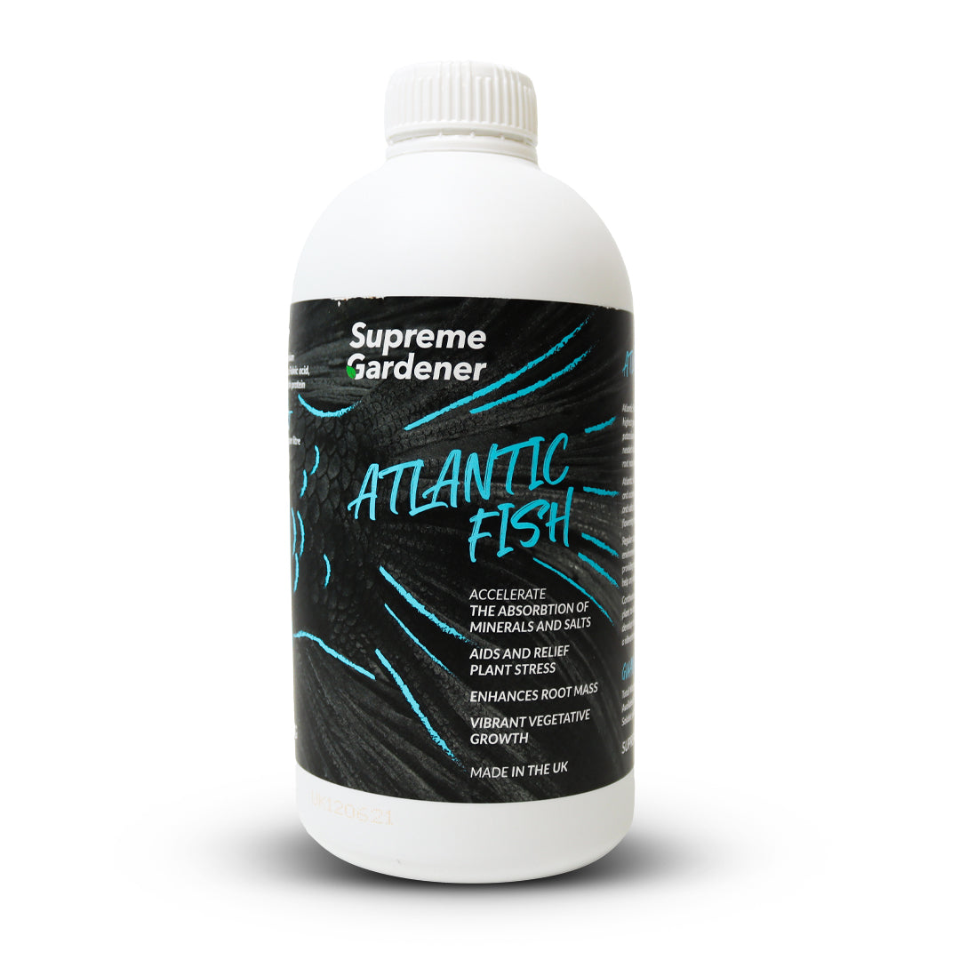 Supreme Gardener Atlantic fish fertiliser, white bottle with ribbed cap and black label, blue text