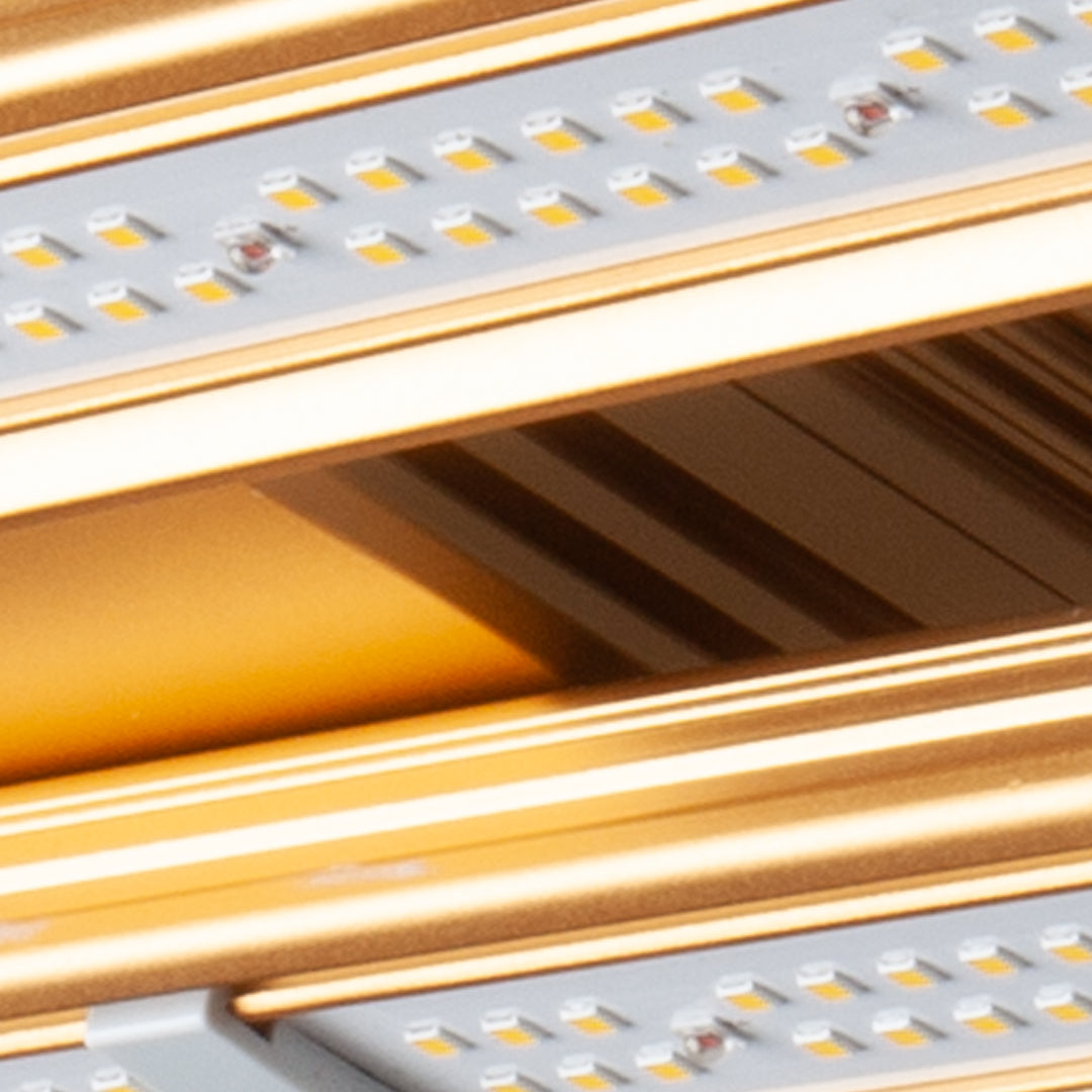 Close-up of LED grow light panel showing rows of white LEDs on aluminum heat sink