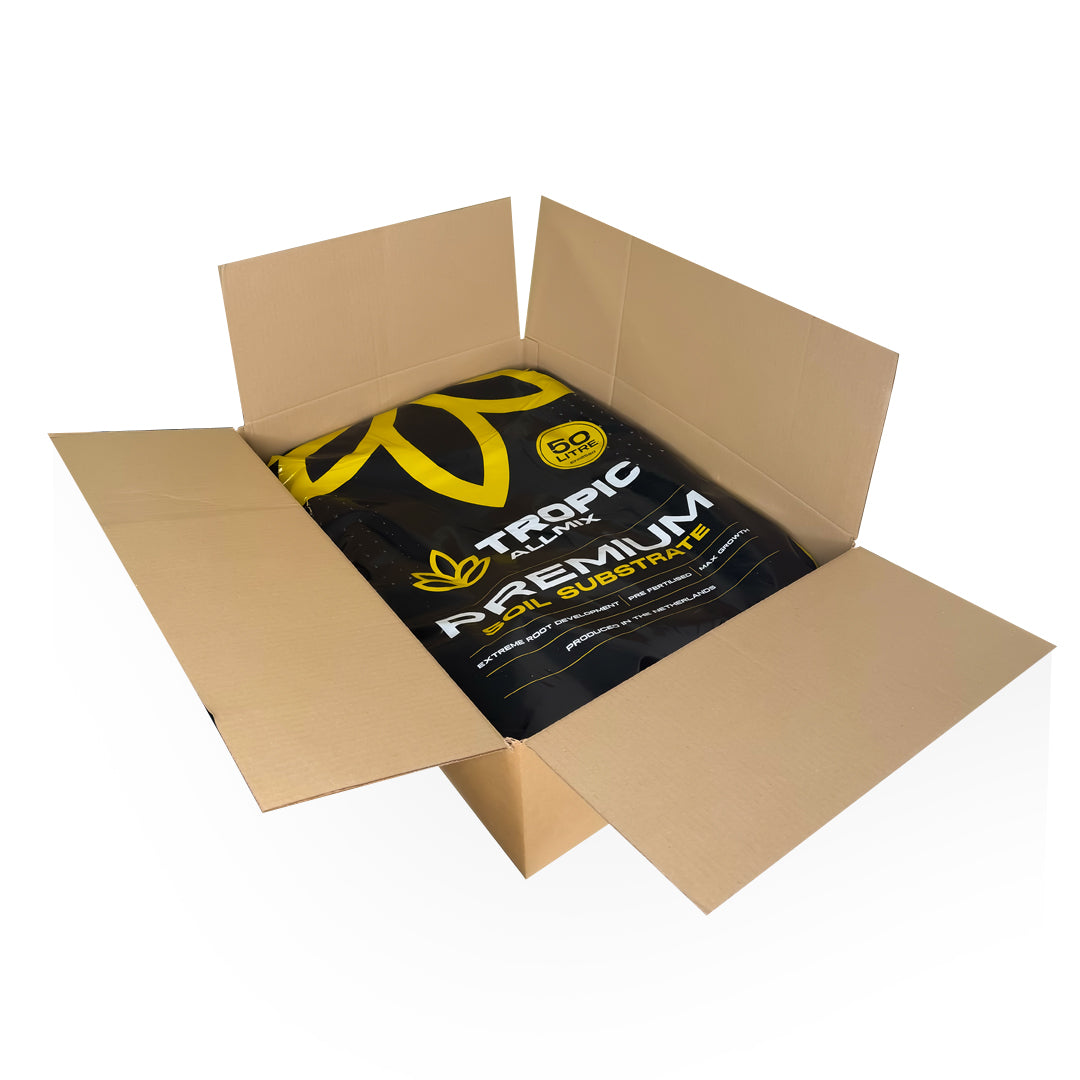 Open cardboard soil box with black soil bag and yellow label accents
