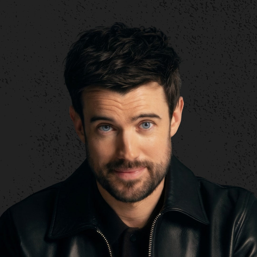 Men's headshot wearing a dark leather jacket