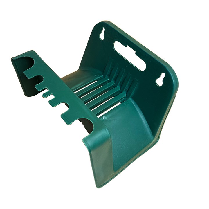 Green plastic hosepipe hanger with prong support and hook slots