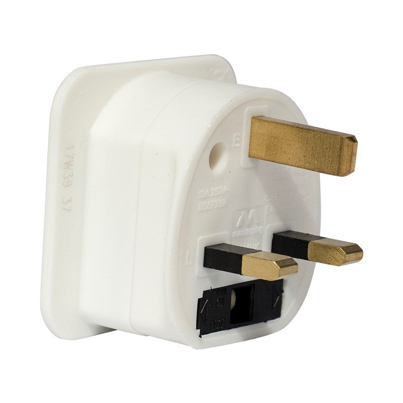 Euro-to-UK plug adaptor with brass pins and white 3-pin output socket