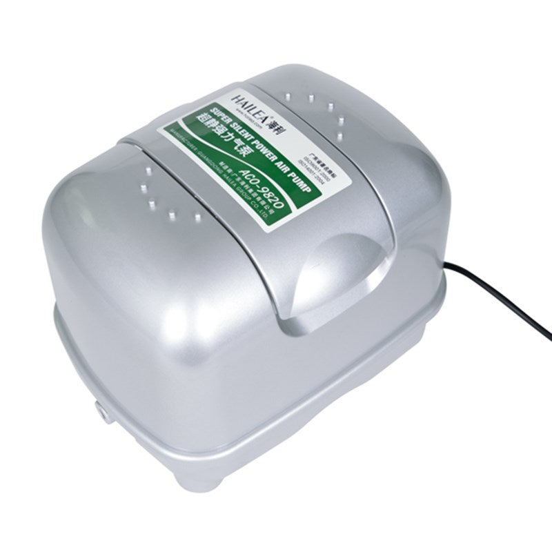 Silver air pump with green label panel, top indicator dots, and attached power cord