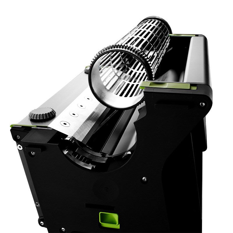 Trimmer machine with exposed twin cylindrical cutting heads and green knobs