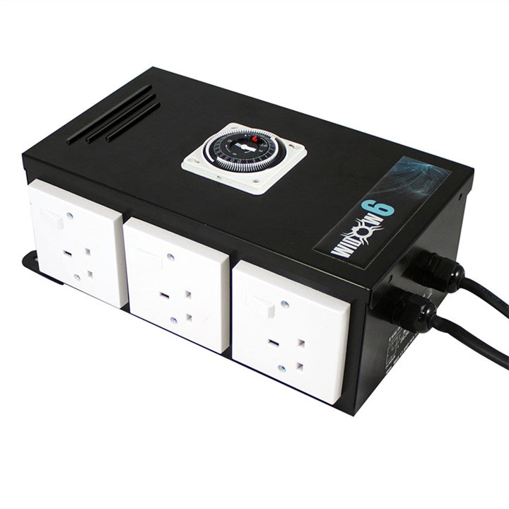 Contactor unit with top rotary dial, black housing, and three white outlet panels