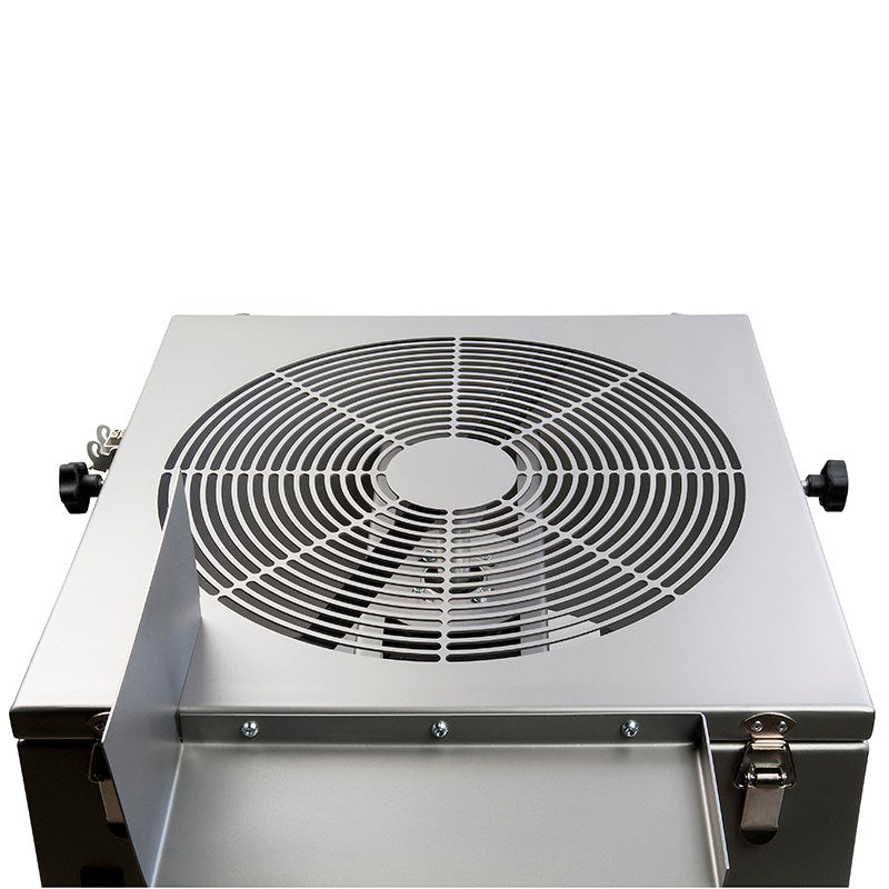 Industrial fan grille on top of Master Trimmer MT Gentle machine housing