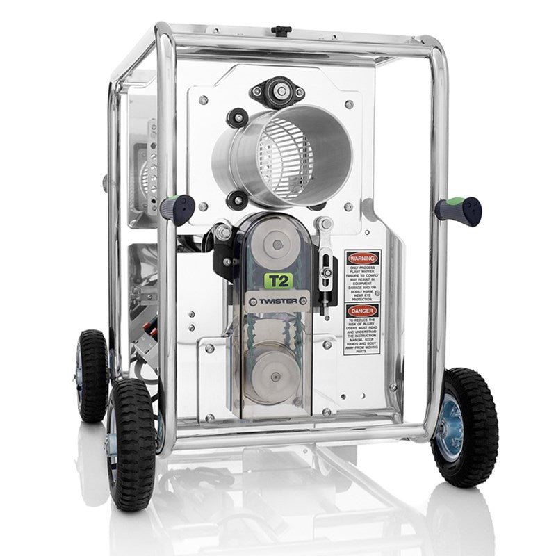 Trimmer machine on wheels with enclosed cutting housing and side controls