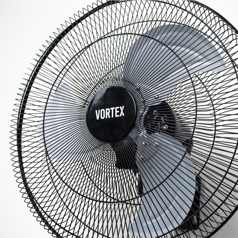 Oscillating wall fan close-up with VORTEX logo hub and three-blade grille