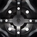 Black plastic underside base with circular hole pattern