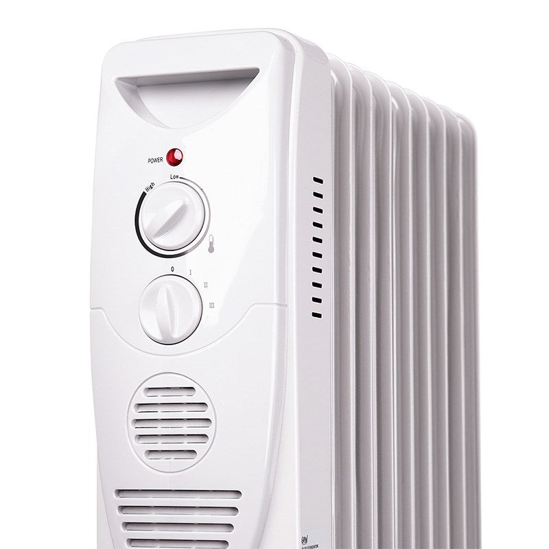 Oil-filled radiator heater front panel with large thermostat knob and power switch, white