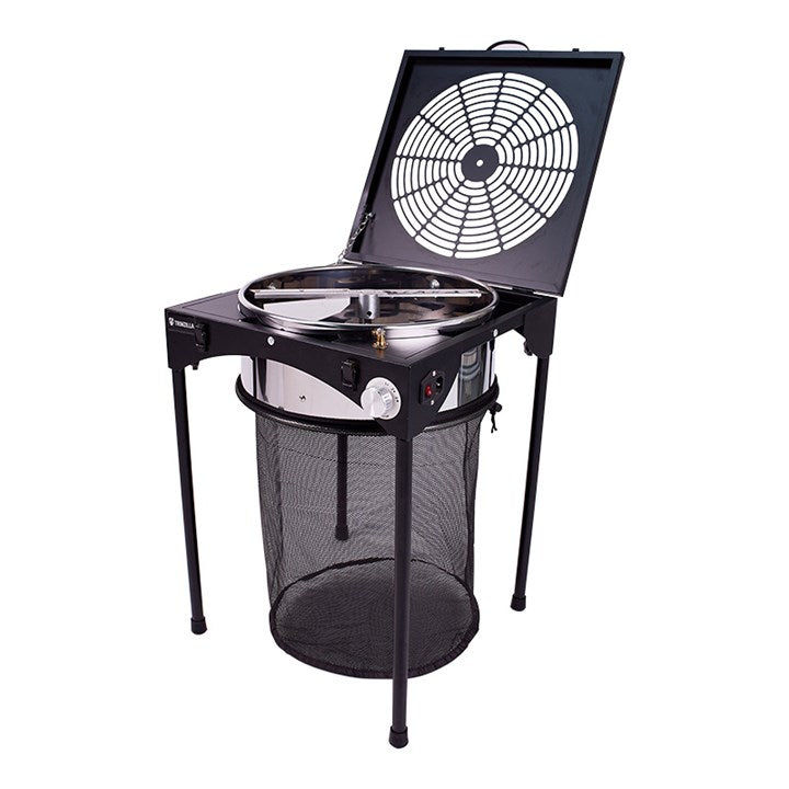Black leaf trimmer with fan-style cutting wheel, mesh bag, and stable legs