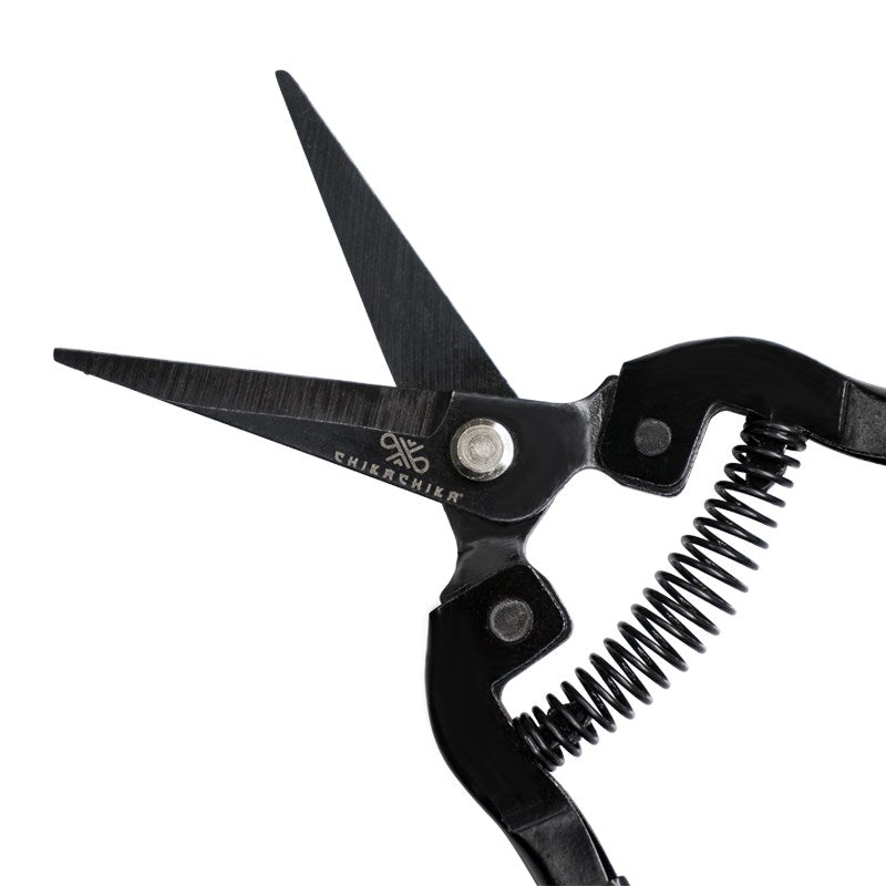 Premium New Wave scissors with comb-teeth section and black handle, spring loaded