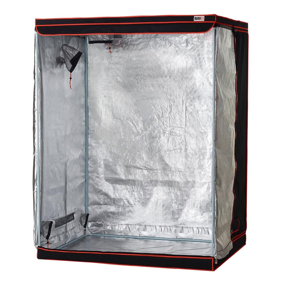 Grow tent open front shows silver reflective floor and a hanging light mount