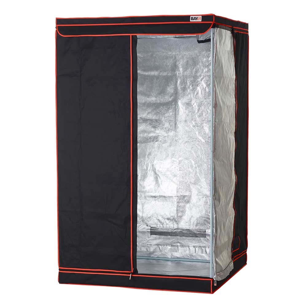 Grow tent front corner view with black panels and orange trim; silver interior visible